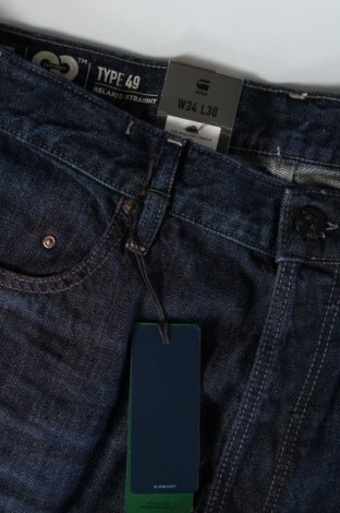 Męskie jeansy G-Star Raw, Rozmiar L, Kolor Niebieski, Cena 108,99 zł