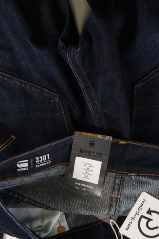 Męskie jeansy G-Star Raw, Rozmiar S, Kolor Niebieski, Cena 76,49 zł