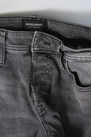 Herren Jeans Jack & Jones, Größe S, Farbe Grau, Preis 23,71 €