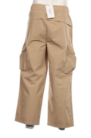 Pánské kalhoty  Calvin Klein Jeans, Velikost L, Barva Béžová, Cena  791,00 Kč
