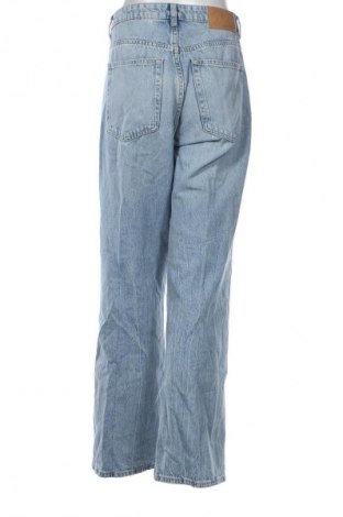 Damskie jeansy H&M, Rozmiar M, Kolor Niebieski, Cena 124,92 zł