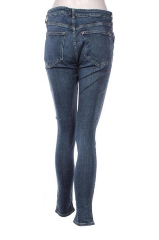 Damskie jeansy H&M, Rozmiar L, Kolor Niebieski, Cena 95,99 zł