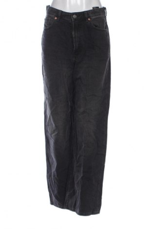 Damskie jeansy H&M Divided, Rozmiar M, Kolor Czarny, Cena 95,99 zł