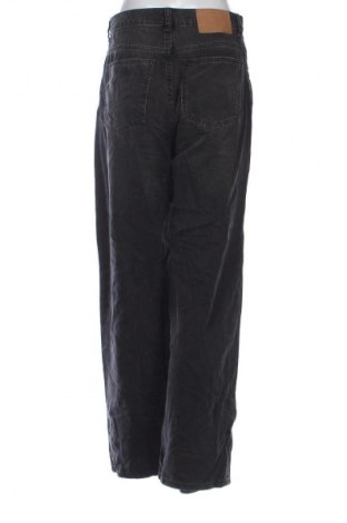 Damskie jeansy H&M Divided, Rozmiar M, Kolor Czarny, Cena 95,99 zł