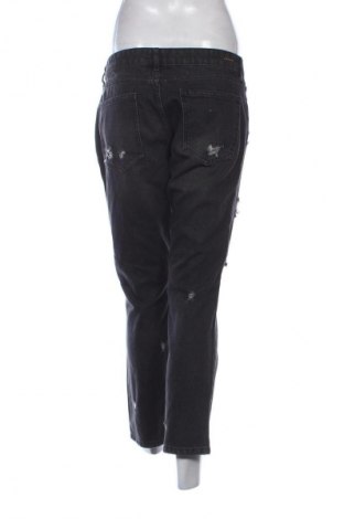 Damskie jeansy River Island, Rozmiar L, Kolor Czarny, Cena 56,99 zł
