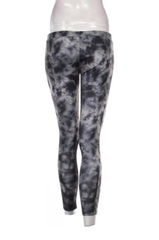 Damskie legginsy Tezenis, Rozmiar M, Kolor Kolorowy, Cena 62,99 zł