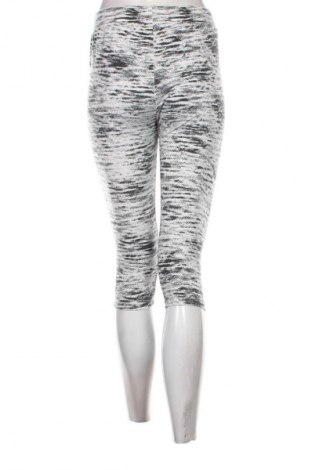 Damskie spodnie Decathlon, Rozmiar M, Kolor Kolorowy, Cena 95,99 zł