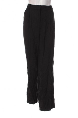 Damskie spodnie H&M, Rozmiar L, Kolor Czarny, Cena 150,99 zł