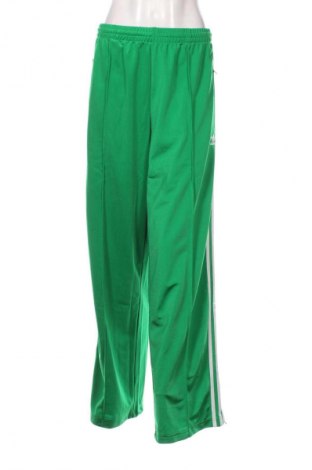 Damskie spodnie sportowe Adidas, Rozmiar L, Kolor Zielony, Cena 305,99 zł