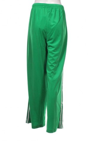 Damskie spodnie sportowe Adidas, Rozmiar L, Kolor Zielony, Cena 305,99 zł