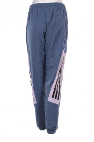 Damskie spodnie sportowe Adidas, Rozmiar M, Kolor Niebieski, Cena 134,99 zł