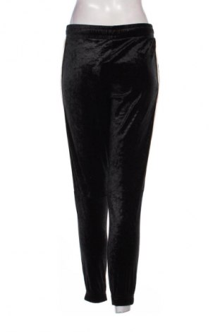 Damen Sporthose Nike, Größe L, Farbe Schwarz, Preis 28,99 €