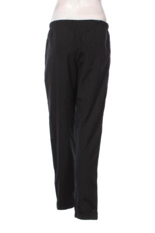 Γυναικείο αθλητικό παντελόνι Sergio Tacchini, Μέγεθος XL, Χρώμα Μαύρο, Τιμή 17,99 €