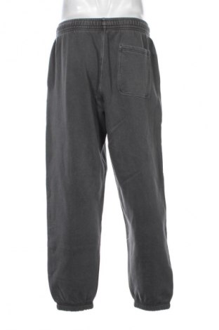 Pánske tepláky Tommy Jeans, Veľkosť L, Farba Sivá, Cena  51,95 €
