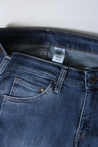 Damskie jeansy H&M, Rozmiar L, Kolor Niebieski, Cena 34,48 zł