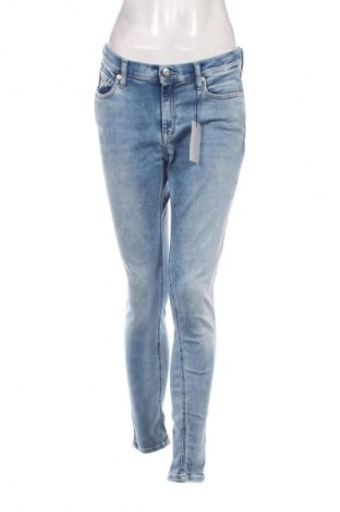 Damskie jeansy Tommy Jeans, Rozmiar L, Kolor Niebieski, Cena 230,99 zł