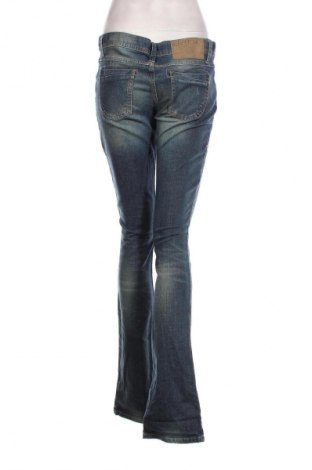 Damskie jeansy United Colors Of Benetton, Rozmiar L, Kolor Niebieski, Cena 47,99 zł