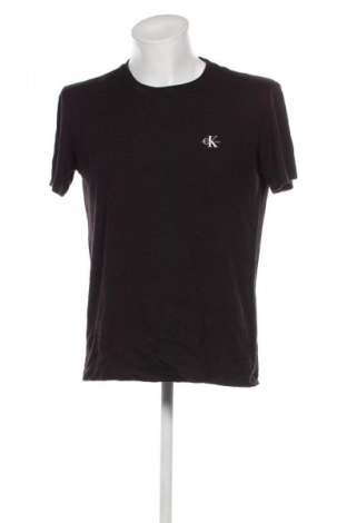 Herren T-Shirt Calvin Klein Jeans, Größe M, Farbe Schwarz, Preis 28,99 €