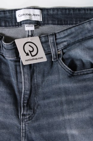 Pánske džínsy  Calvin Klein Jeans, Veľkosť M, Farba Modrá, Cena  32,95 €