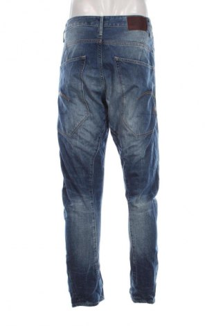 Męskie jeansy G-Star Raw, Rozmiar S, Kolor Niebieski, Cena 307,06 zł