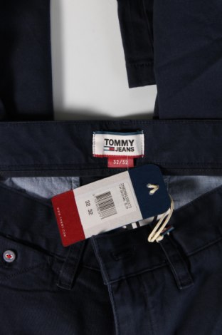 Męskie spodnie Tommy Jeans, Rozmiar M, Kolor Niebieski, Cena 378,99 zł