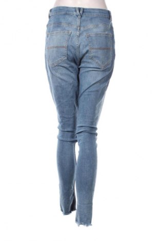 Damskie jeansy H&M Divided, Rozmiar L, Kolor Niebieski, Cena 95,99 zł