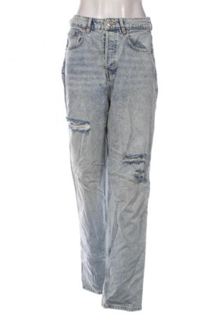 Damskie jeansy H&M Divided, Rozmiar M, Kolor Niebieski, Cena 95,99 zł