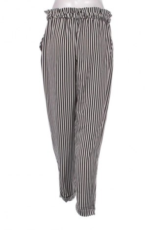 Damskie spodnie Pull&Bear, Rozmiar L, Kolor Kolorowy, Cena 68,97 zł