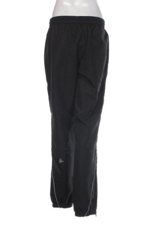 Damskie spodnie sportowe Craft, Rozmiar M, Kolor Czarny, Cena 134,99 zł