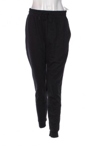 Damskie spodnie sportowe Decathlon, Rozmiar XL, Kolor Czarny, Cena 150,99 zł