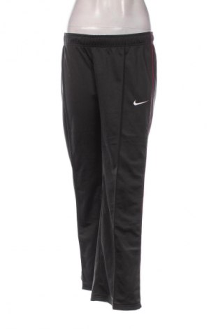 Dámské tepláky Nike, Velikost L, Barva Šedá, Cena  659,00 Kč
