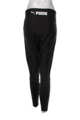 Damen Sporthose PUMA, Größe L, Farbe Schwarz, Preis 28,99 €
