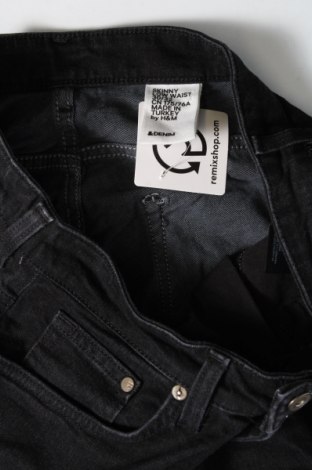 Damskie jeansy H&M, Rozmiar L, Kolor Czarny, Cena 92,76 zł