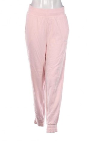 Γυναικείο αθλητικό παντελόνι PUMA, Μέγεθος M, Χρώμα Ρόζ , Τιμή 51,78 €