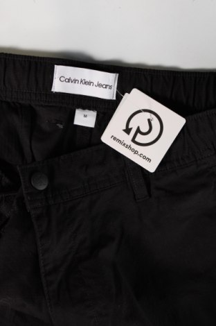 Pánské kalhoty  Calvin Klein Jeans, Velikost M, Barva Černá, Cena  1 089,00 Kč