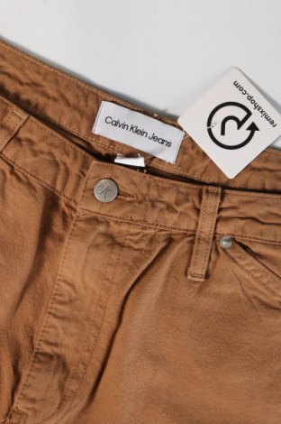 Pánské kalhoty  Calvin Klein Jeans, Velikost L, Barva Oranžová, Cena  1 305,00 Kč