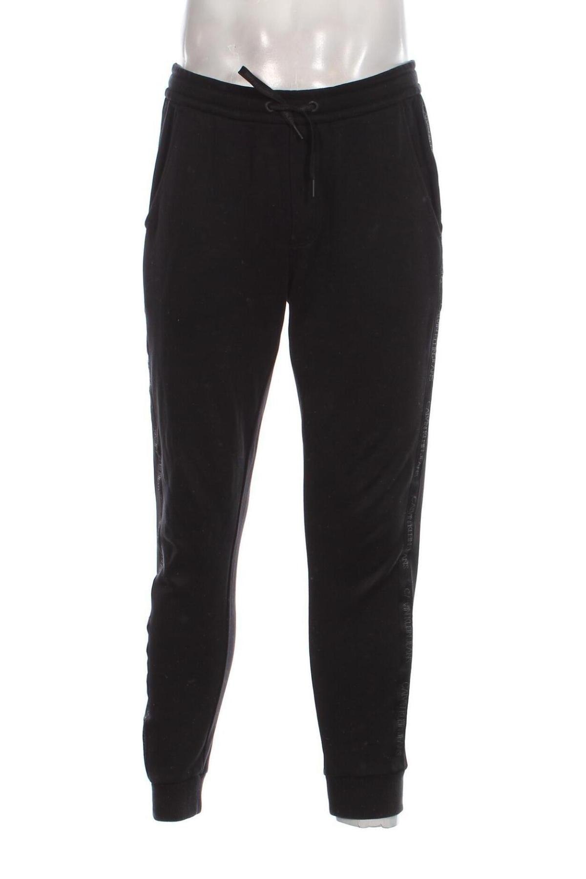 Pantaloni trening de bărbați Calvin Klein Jeans, Mărime M, Culoare Negru, Preț 201,99 Lei