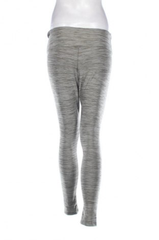 Damskie legginsy Decathlon, Rozmiar L, Kolor Kolorowy, Cena 58,43 zł
