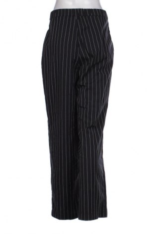 Damskie spodnie H&M Divided, Rozmiar L, Kolor Kolorowy, Cena 62,07 zł