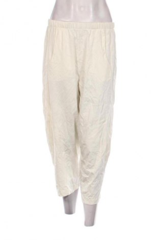 Damskie spodnie Made In Italy, Rozmiar L, Kolor ecru, Cena 76,99 zł