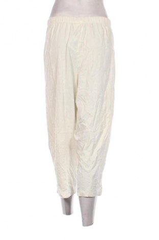 Damskie spodnie Made In Italy, Rozmiar L, Kolor ecru, Cena 76,99 zł