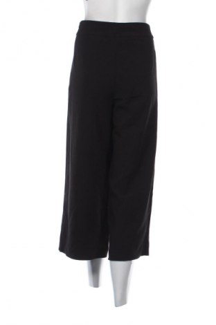 Damskie spodnie United Colors Of Benetton, Rozmiar M, Kolor Czarny, Cena 94,38 zł