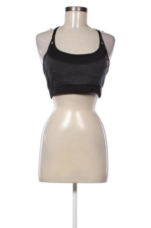 Damski sportowy top H&M, Rozmiar L, Kolor Czarny, Cena 34,48 zł