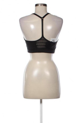 Damski sportowy top H&M, Rozmiar L, Kolor Czarny, Cena 34,48 zł