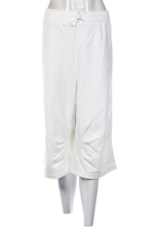Damskie spodnie sportowe Nike, Rozmiar XL, Kolor ecru, Cena 213,79 zł