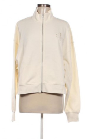 Dámsky športový vrch  Calvin Klein Jeans, Veľkosť L, Farba Kremová, Cena  57,95 €