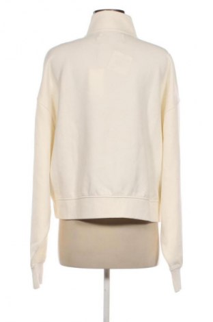 Dámsky športový vrch  Calvin Klein Jeans, Veľkosť L, Farba Kremová, Cena  57,95 €