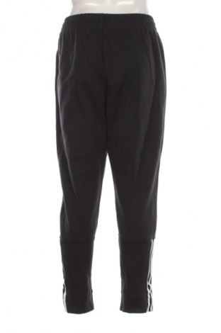 Męskie spodnie sportowe Adidas, Rozmiar XL, Kolor Czarny, Cena 157,99 zł