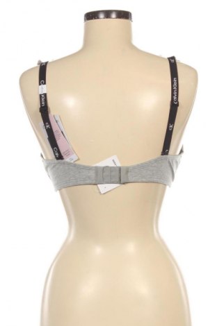 Сутиен Calvin Klein, Размер L, Цвят Сив, Цена 68,99 лв.