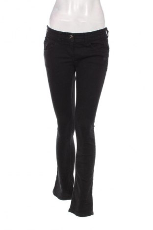 Damskie jeansy River Island, Rozmiar M, Kolor Czarny, Cena 19,99 zł